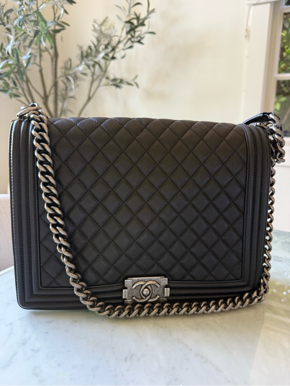 CHANEL Black Quilted Boy Flap Shoulder Bag with Silver Chain